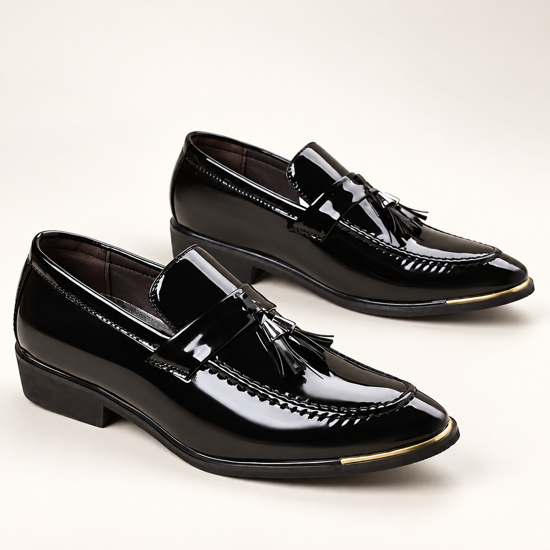 Alistair black patent tassel loafers, side profile studio view