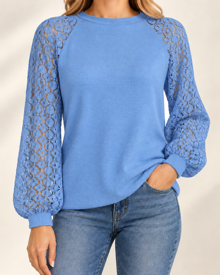 Clara knit top in blue, studio model photograph