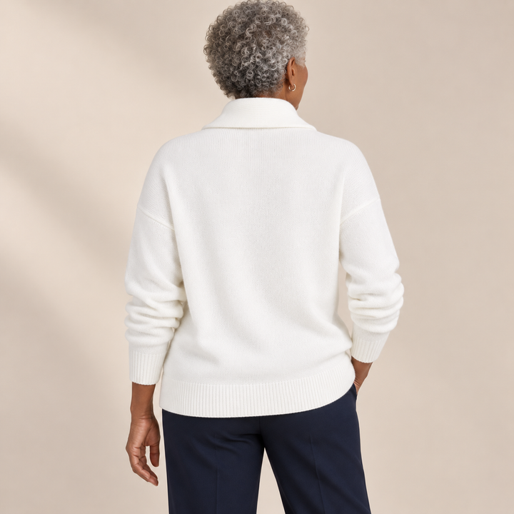 Elise white jumper, back view on mature model