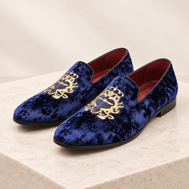 Hugo royal blue velvet loafers pair, front three-quarter studio view