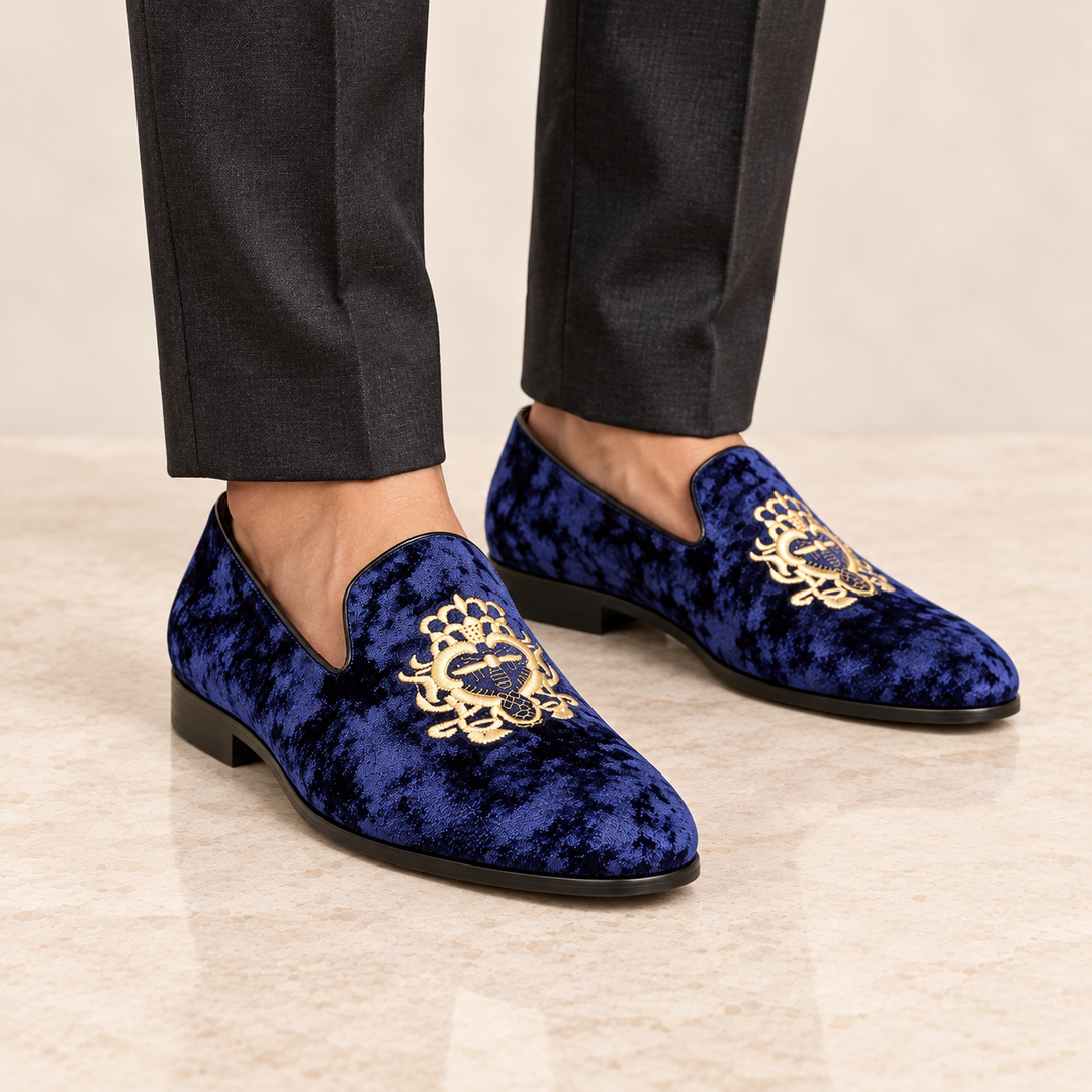 Hugo royal blue velvet loafers worn, cropped studio view