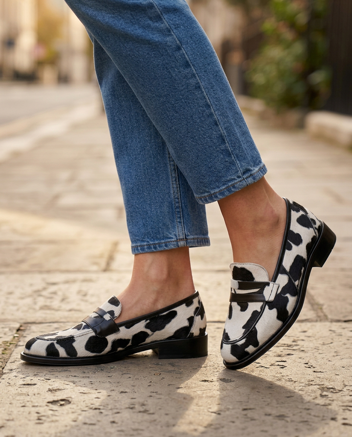 Nives Cow-Print Penny Loafers