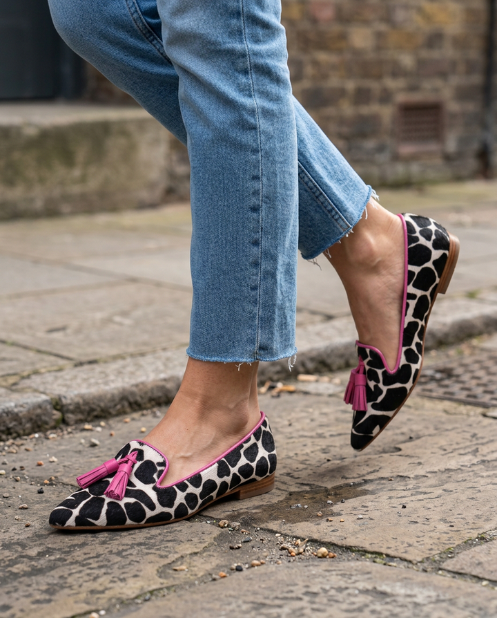 Ginevra Black & White Cow-Print Loafers with Pink Tassels