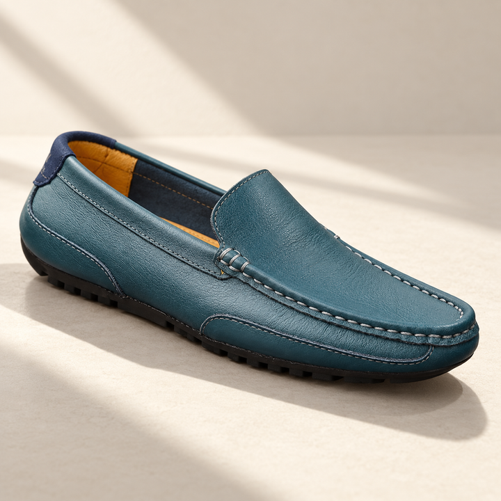 Matteo loafers in petrol blue, studio view.