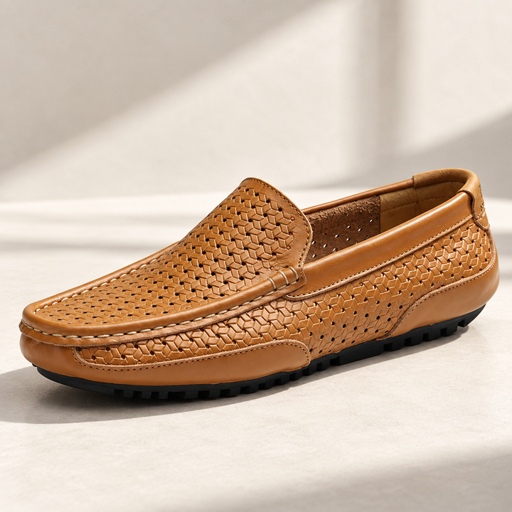 Ravello leather driving loafer in perforated tan, studio view.