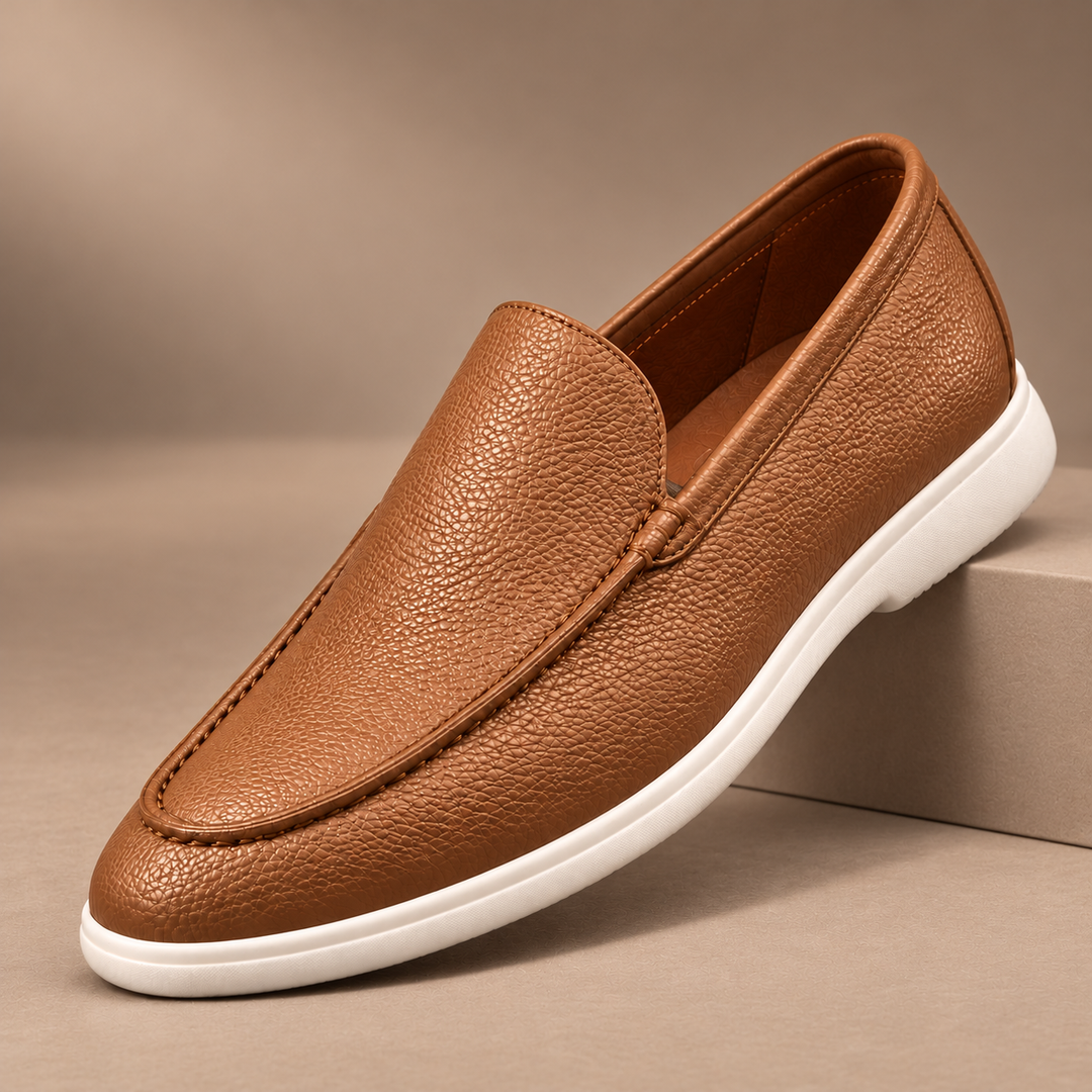 Gianni Genuine Pebbled Leather Loafers in light brown, photographed in a warm taupe studio