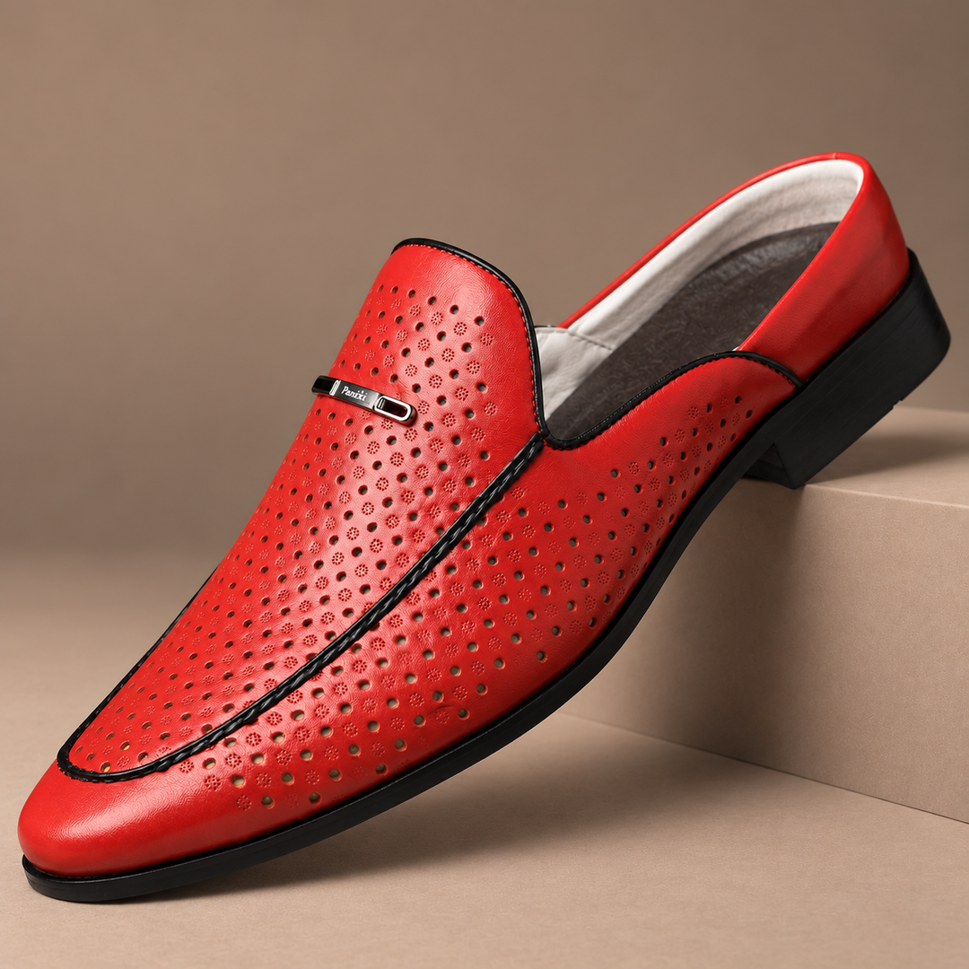 Castagnozzi Genuine Leather Perforated Loafers in red, photographed in a warm taupe studio