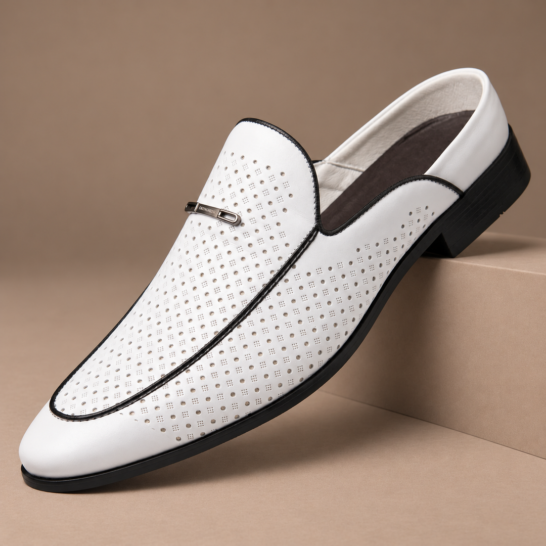 Castagnozzi Genuine Leather Perforated Loafers in white, photographed in a warm taupe studio
