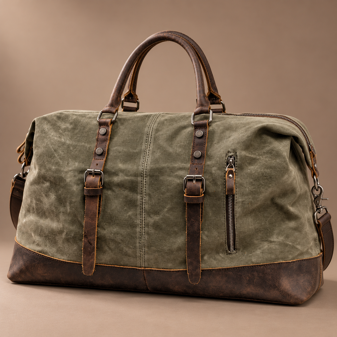 Heinrich Canvas Weekend Bag with Leather Trim in army green, photographed in a warm taupe studio