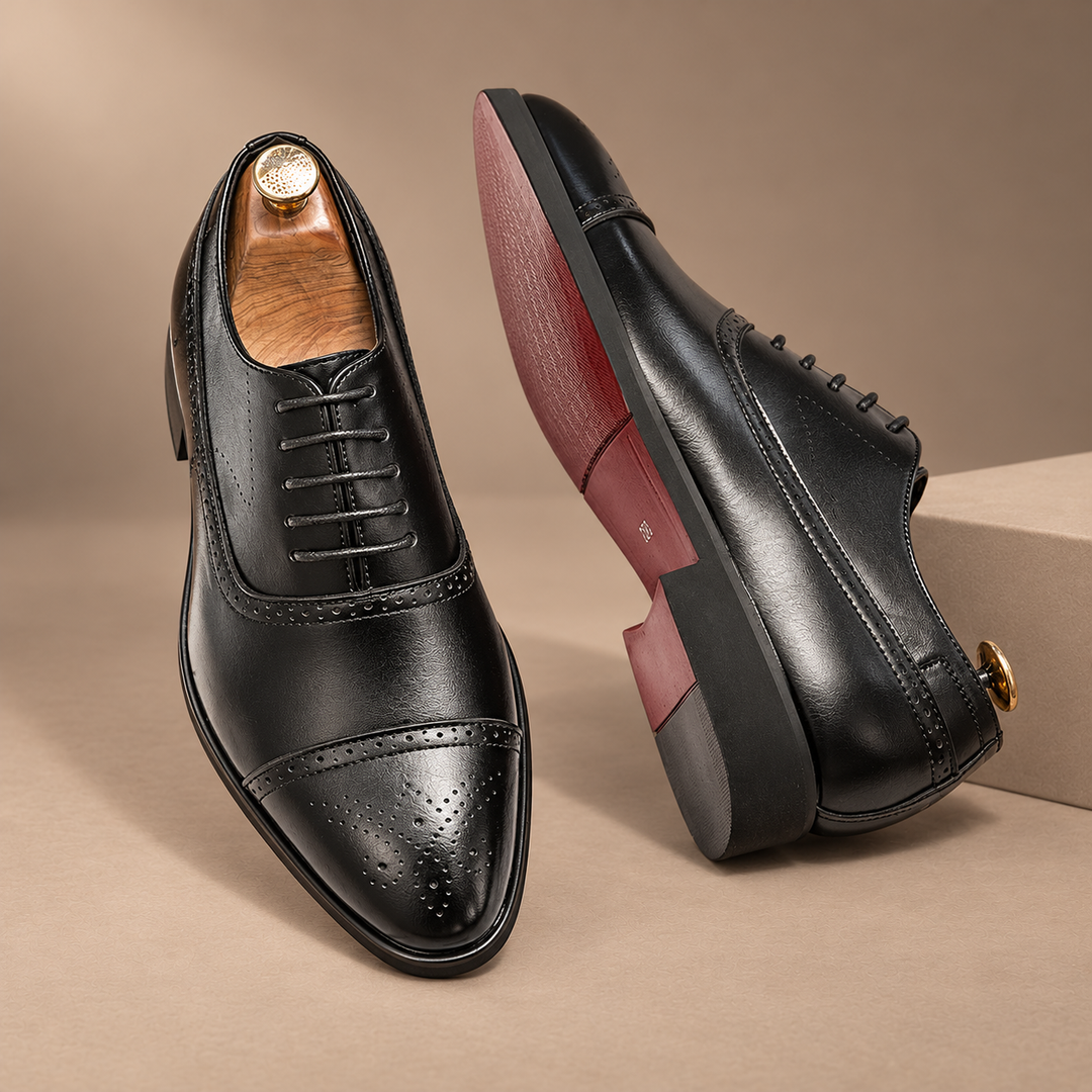 Genuine Leather Oxford Brogues in black, photographed in a warm taupe studio