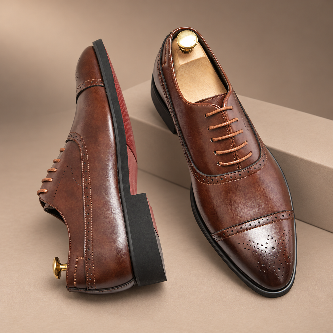 Genuine Leather Oxford Brogues in brown, photographed in a warm taupe studio
