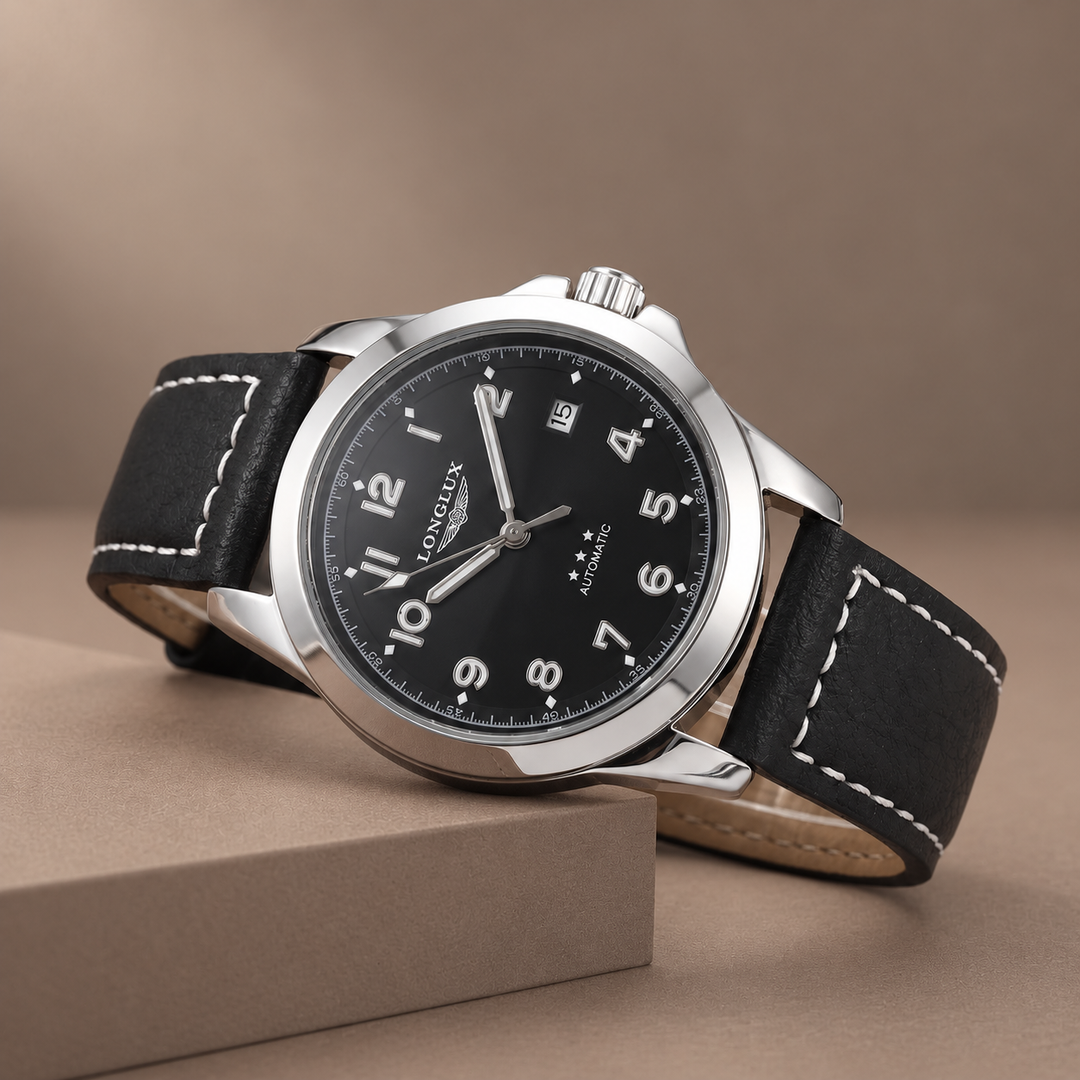 Classic Pilot Watch with Genuine Leather Strap in black, photographed in a warm taupe studio