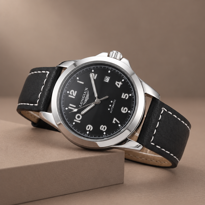 Classic Pilot Watch with Genuine Leather Strap in black, photographed in a warm taupe studio