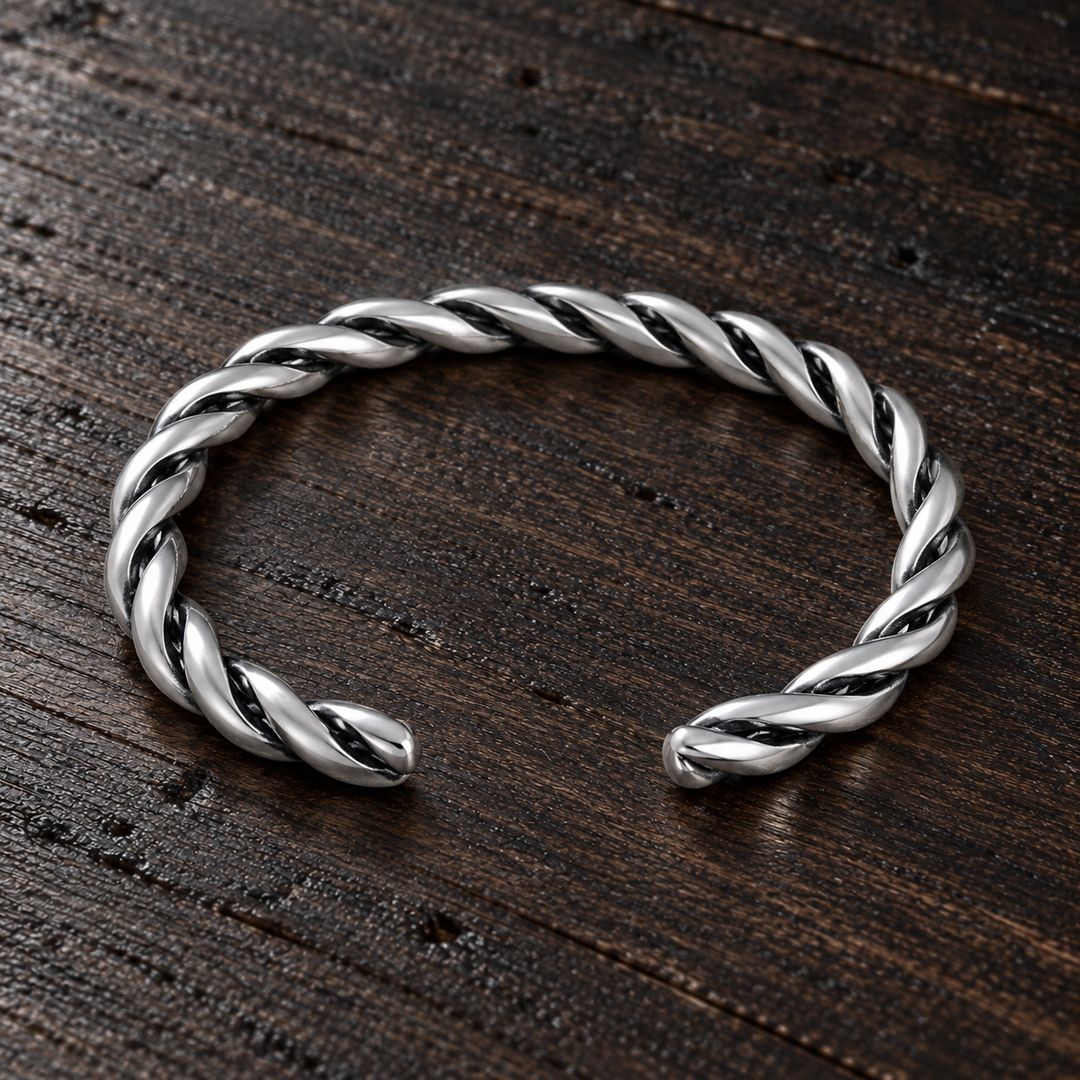 The Soho B-511S sterling silver twisted cuff, lying flat with its open ends aligned