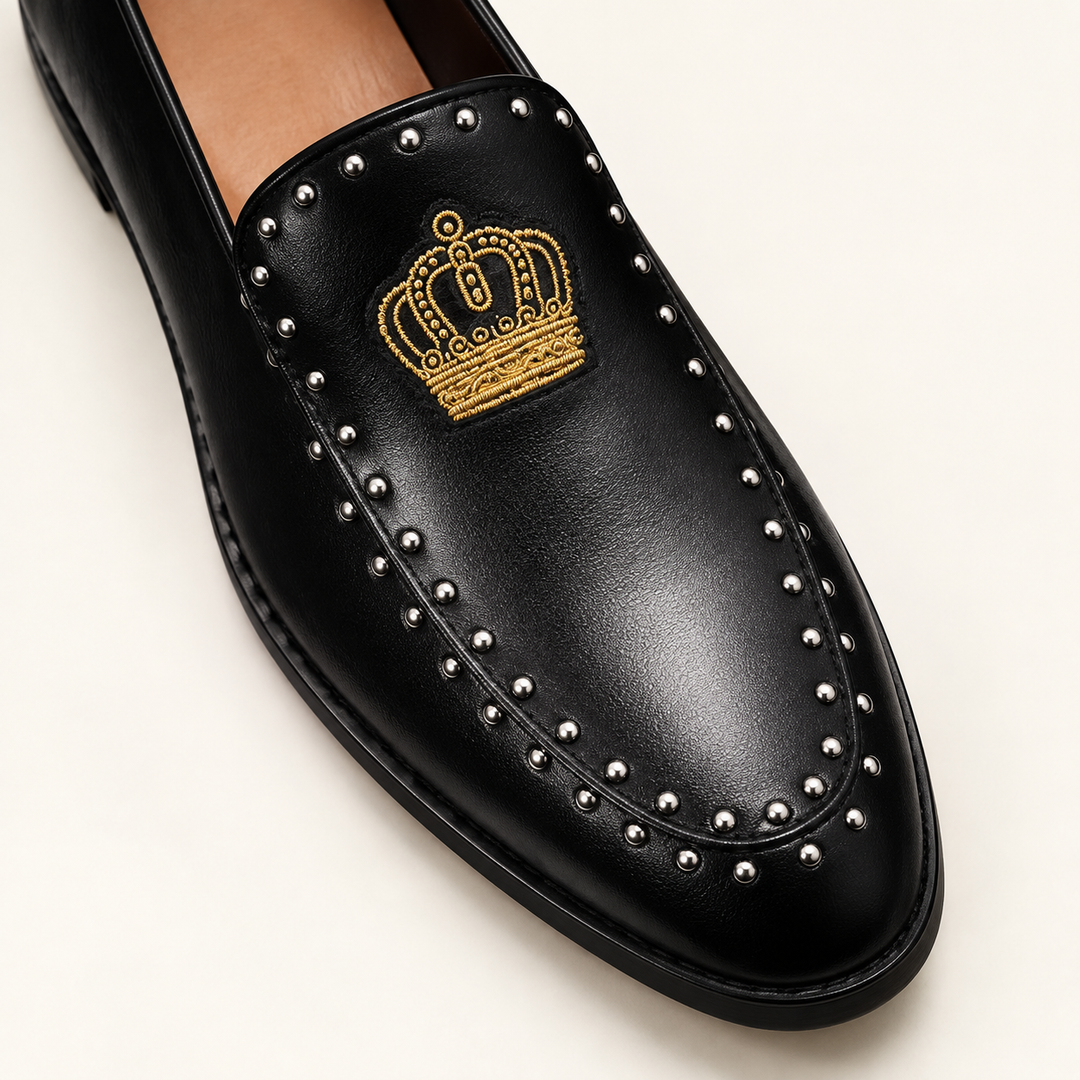 Black Winston loafer — gold crown embroidery and silver-tone stud detail
